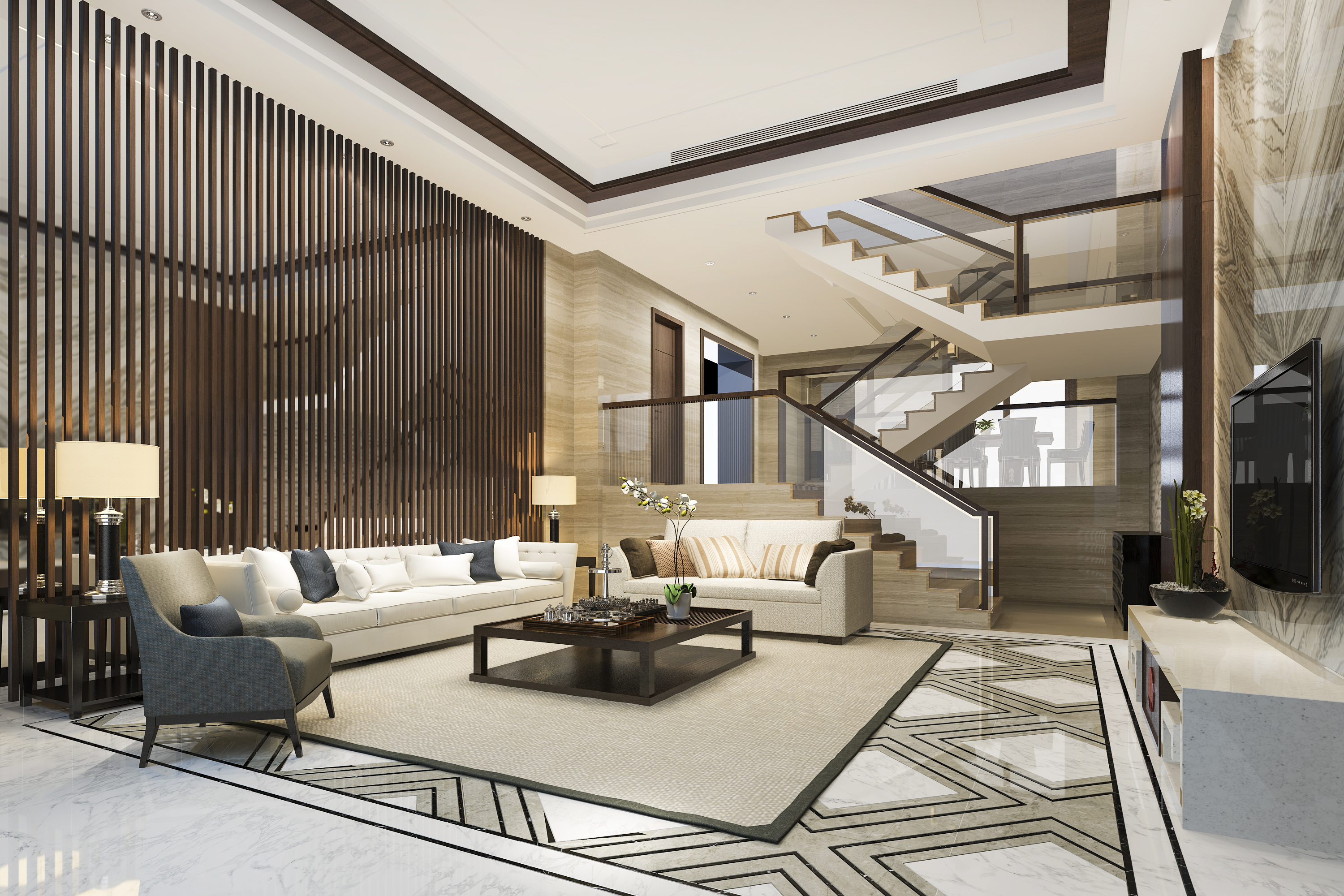 Bright, luxury South Florida living room with marble floors and a staircase